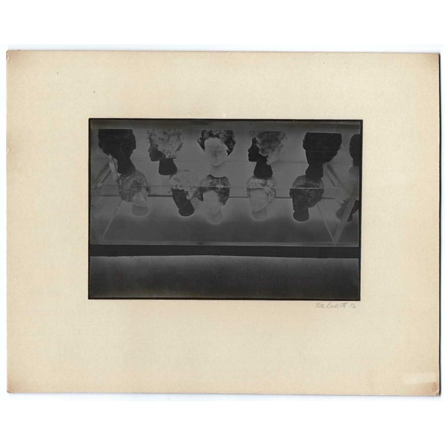 1976 black and white photo of mannequin heads and wigs by Rita DeWitt (born 1948). Rita DeWitt (1948) love of photography...