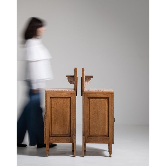 Rendered in the sinuous vocabulary of Art Nouveau, this exquisite pair of French side tables from the early twentieth...