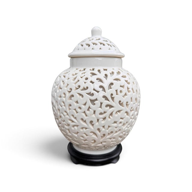 Vintage Hollywood Regency / Chinoiserie style petite ginger jar accent lamp featuring a warm white glazed ceramic body...