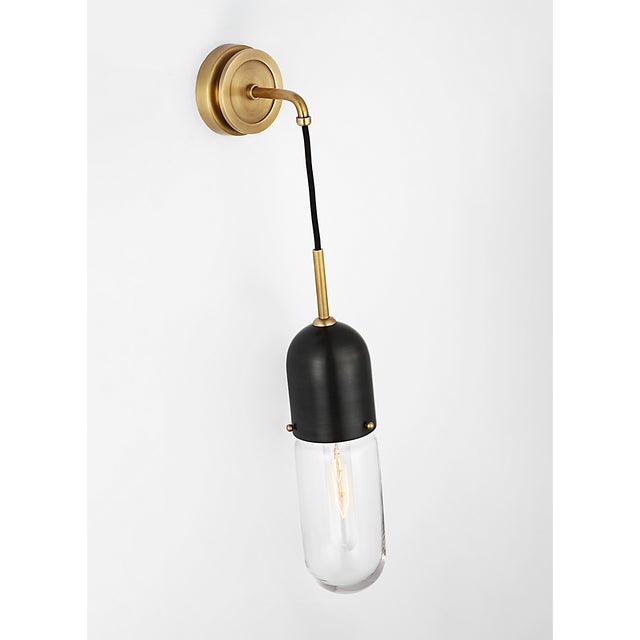 Junio Wall Light in Bronze and Brass with Clear Glass Designer: Thomas O'Brien Finish: Bronze and Brass Height: 26" Width:...