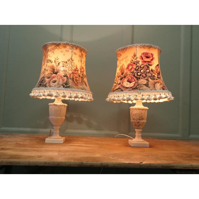 A Pair of White Marble Vase Lamps A Lovely Vintage pair they come with matching chintz shades The lamps have marble bases...