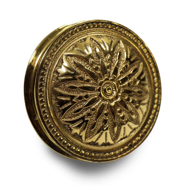 This radial brass entry door knob was made by Hopkins & Dickinson in the 1879 catalog. Classic/Vernacular style. Part of...