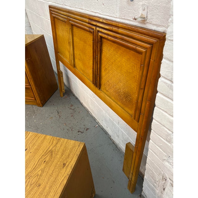 Vintage Lea Furniture queen faux bamboo headboard featuring a split reed rattan cane panel and warm honey finish. Please...
