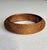 Vintage mid-century Brutalist bangle bracelet featuring a wide, domed profile covered in dense woven mesh with a repeating...