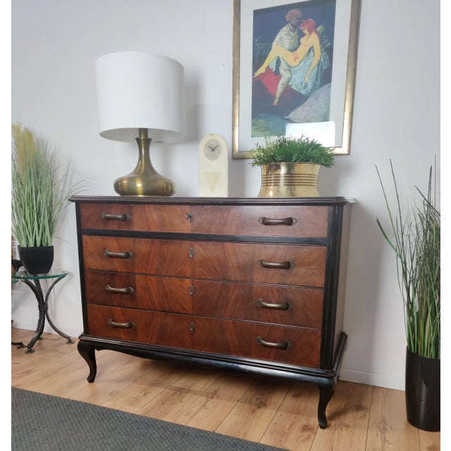 Beautiful Italian 1960s dresser, commode or chest of 4 drawers in elegant and classic wood worked according its veneer...