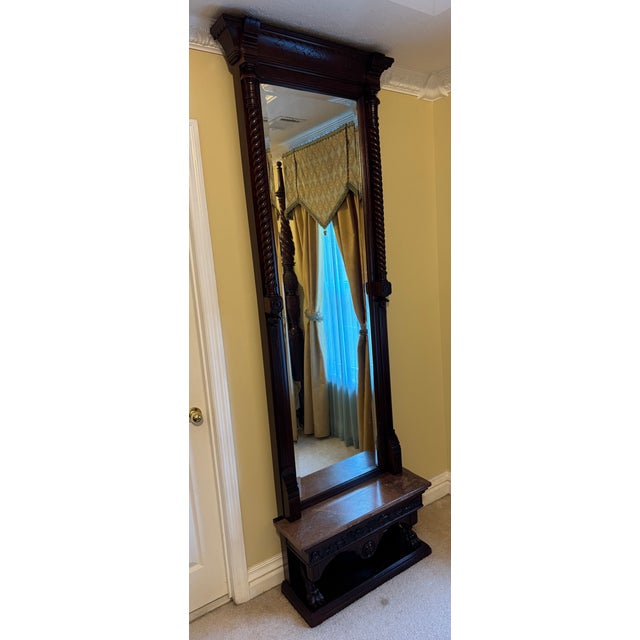 An exceptional, investment-grade example of late 19th-century American craftsmanship, this Antique Victorian Pier Mirror...
