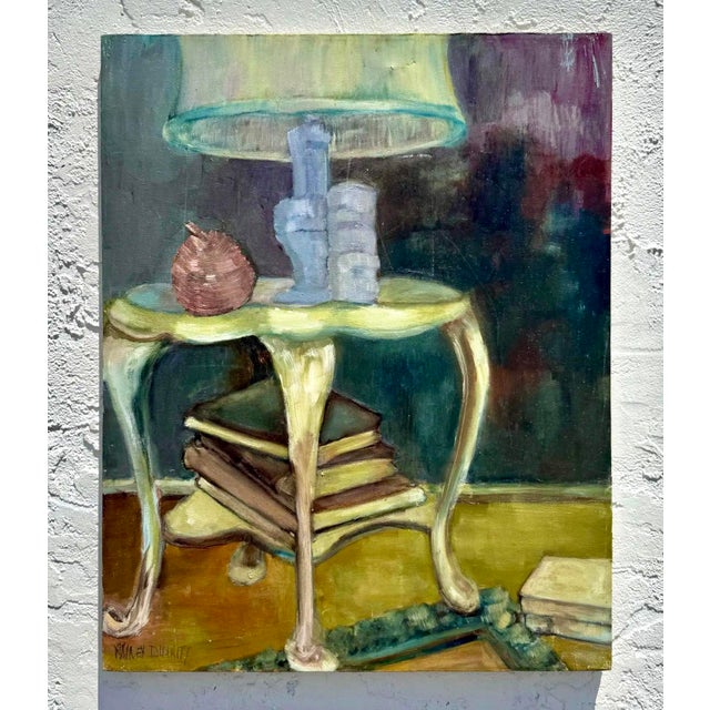 An intimate still life scene capturing a quiet corner of a lived-in space, this expressive painting centers around a...
