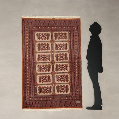 Bukhara rug in cotton and wool, hand-made. This piece is attributed to the mentioned designer/maker. It has no attribution...