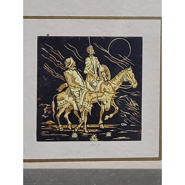 Vintage gold engraving of Don Quixote as he rides the roads of Spain in search of glory and grand adventure and his...