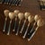 Metal 1960s Mid-Century Modern Black & Brass Flatware Set – 50 Pieces, Stainless Steel With Riveted Handles - Utensils For Sale - Image 7 of 9