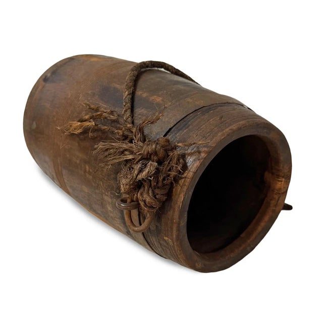 Vintage wooden pot with rope carrying handle originally used for carrying water. Wonderful piece with authentic signs of...