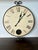 Gorgeous Howard Miller Magellan Wall Clock with an antique crackle dial and wrought iron frame. In excellent condition and...