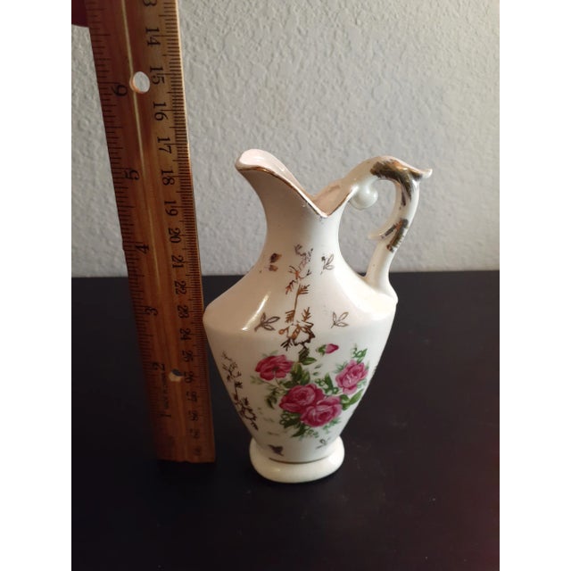 This is a Handpainted Floral Bud Vase likely Made in Germany. Procured at an estate sale