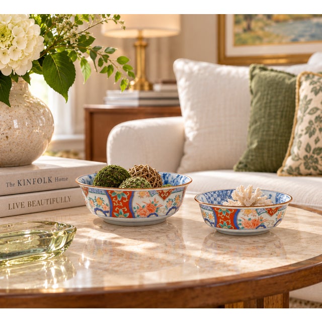 Beautiful matched pair of Japanese Imari-style porcelain bowls featuring colorful blue, red, orange, green, and gilt...