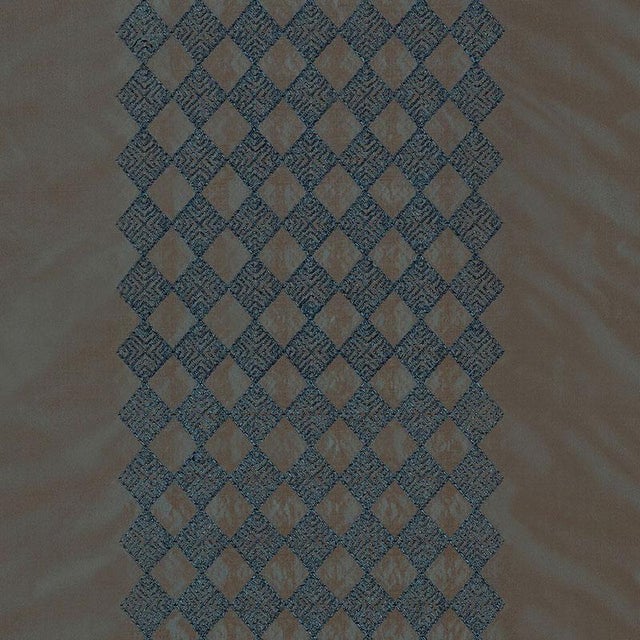 An iridescent shimmer radiates luxury and glamour. Embroidered with a versatile crisscross geometric pattern. Minimum...