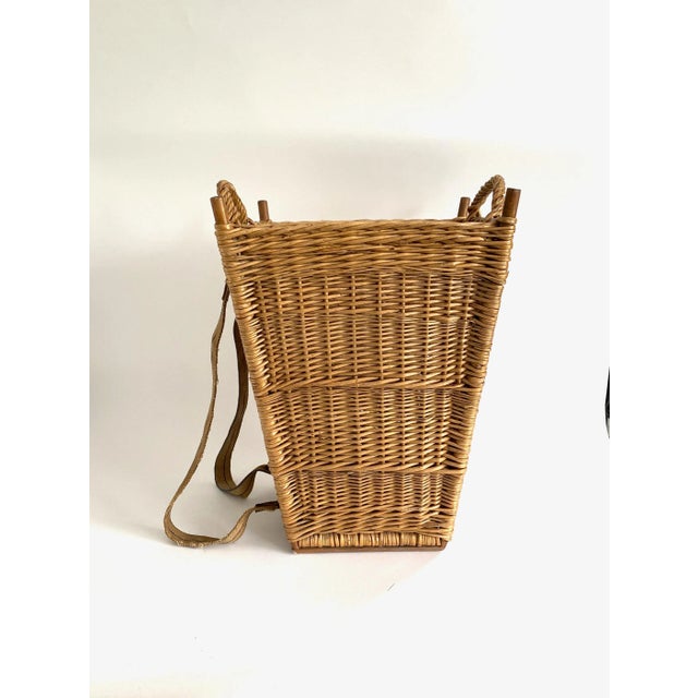 An exceptional German hand braided early 1900s double handed basket with shoulder straps that were used to carry heavy...