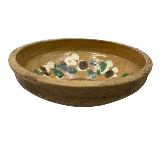 This antique terra cotta decorative bowl from Hungary is a wonderful addition to any Farmhouse decor. The rustic piece...