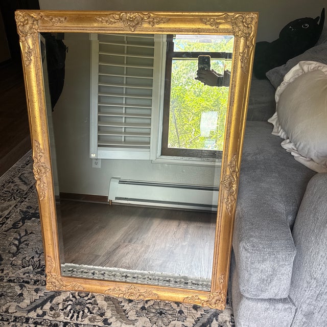 Elegant vintage Louis XV-style giltwood mirror by De La Torre Bros. of Pico Rivera, California, showcasing exquisite...