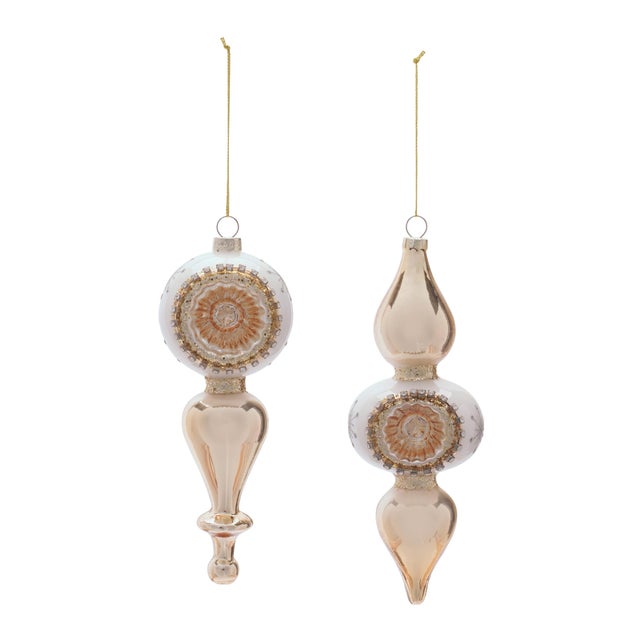 Add dramatic height and vintage-inspired sparkle to your holiday décor with this Glass Finial Reflector Ornament Set....