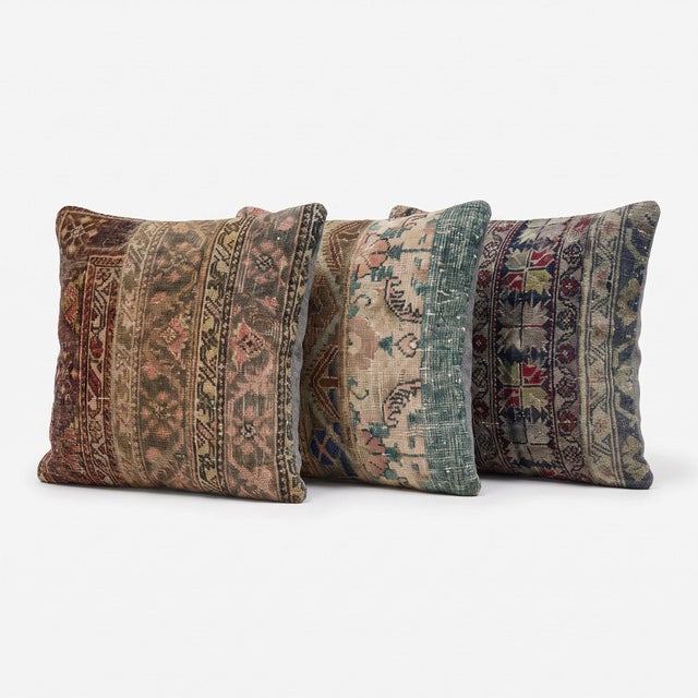 This 24'' x 24'' pillow cover set was made from authentic Turkish rug pieces — soft tribal stripes in blush, sage and...