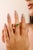 This elegant ring features a marquise-cut emerald weighing 0.65 carats, set in 14K solid yellow gold. The emerald measures...