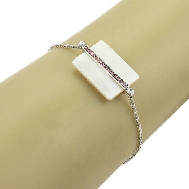 The Victoria Casal Pink Sapphire & Pink Mother of Pearl 18k White Gold Bracelet is a stunning piece of vintage and antique...