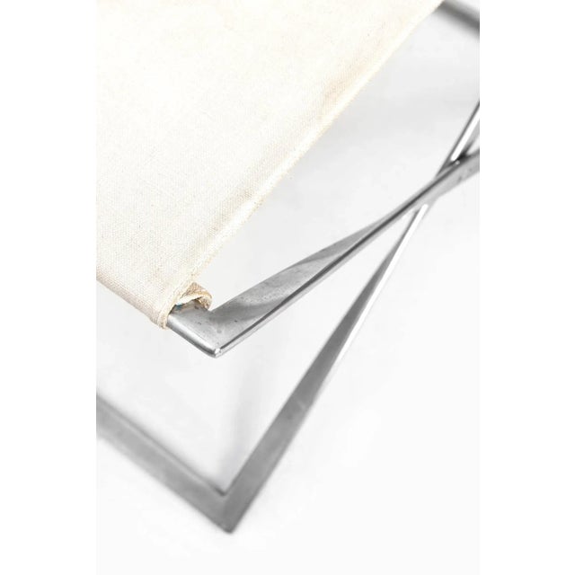 Rare foldable stool, model PK-91 designed by Poul Kjærholm. Produced by E. Kold Christensen in Denmark. This piece is...