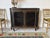 Hollywood Regency 1930s Hollywood Regency Ebonized & Giltwood Wire-Mesh Door Cabinet For Sale - Image 3 of 12
