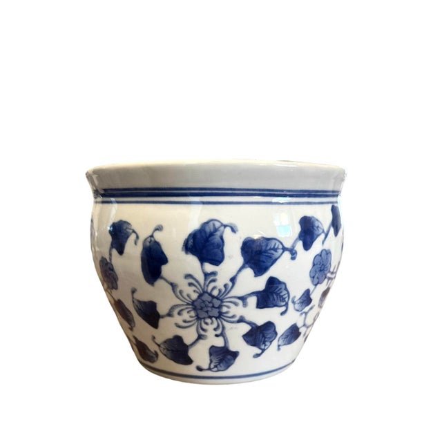 A charming, vintage petite blue & white chinoiserie orchid pot/planter. Features stylized flower and vine motifs in blue...