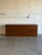 This substantial dresser features a clean, monolithic silhouette with a flush plinth base. Designed by Jack Cartwright, it...