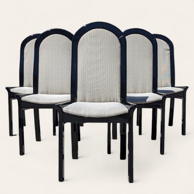Bring timeless design into your home with this set of six Italian Postmodern dining chairs in black lacquered solid wood...