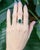 This gorgeous statement ring features a 3-carat emerald gemstone of size 11x9mm with natural earth-mined diamonds, all set...