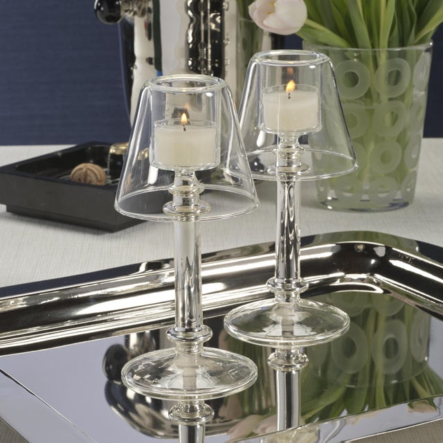 The Isola Glass Tealight Lamp brings understated elegance to any space with its minimalist yet refined design. Crafted...