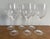 This is a listing for six Wedgwood wine glasses in the Vera Wang-designed BLANC SUR BLANC pattern, which was discontinued...