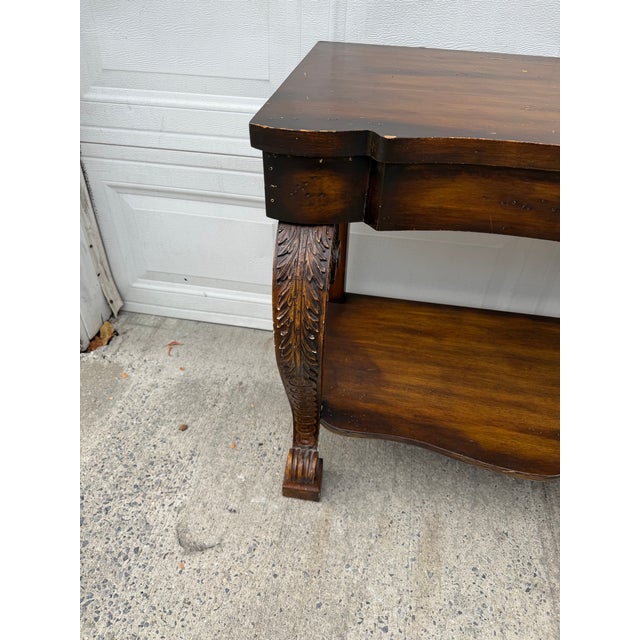 Vintage Neoclassical Revival Console Table With Ornately Carved Scroll Supports and Lower Shelf For Sale - Image 10 of 12