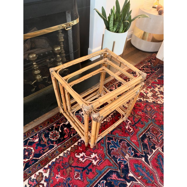 Add a touch of organic warmth and effortless vintage style to your space with this charming set of three bamboo nesting...
