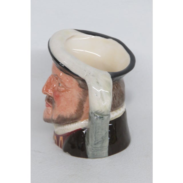 This charming Character Jug is made of porcelain / bone china. This character mug is stamped as being made in England by...