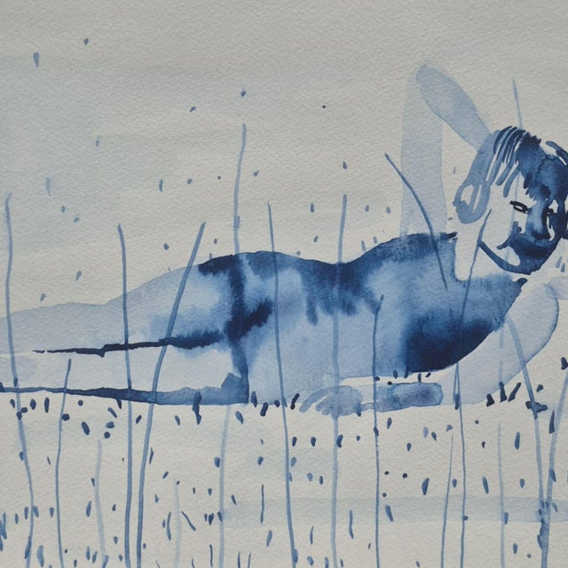 A delicate study of repose. This 2022 watercolour captures a moment of profound stillness. A nude figure reclines in a...