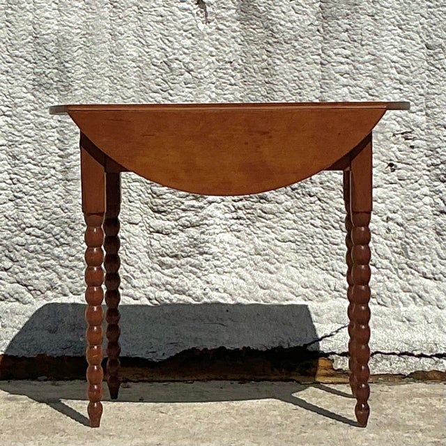 Bring timeless charm to your space with this vintage traditional bobbin side table. Showcasing beautifully turned spindle...