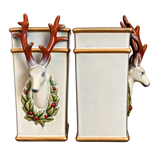 Charming pair of vintage Christmas ceramic reindeer vases, circa 1960s, standing approximately 10 inches tall. Each...