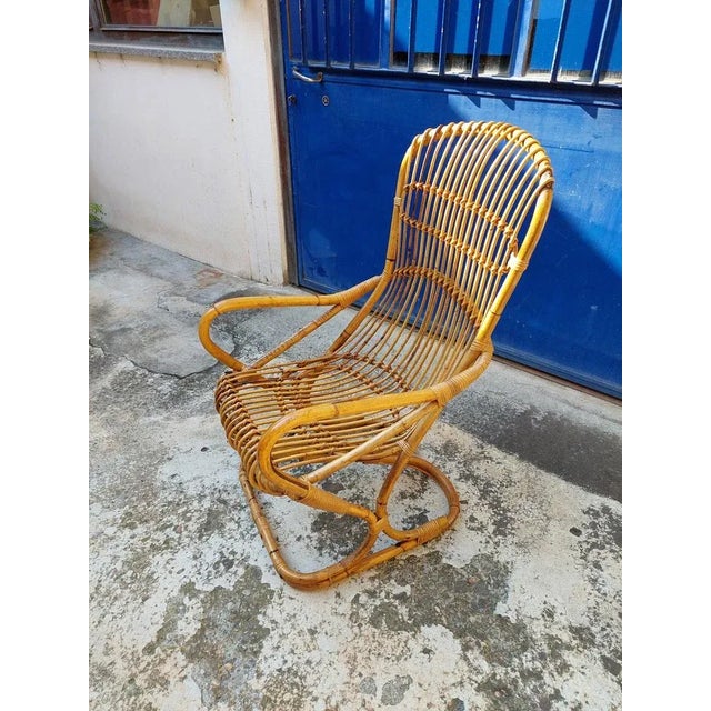 Armchair/chair from living room in bamboo with high backrest, attributed to the designer Tito Agnoli, made in the 1960s....