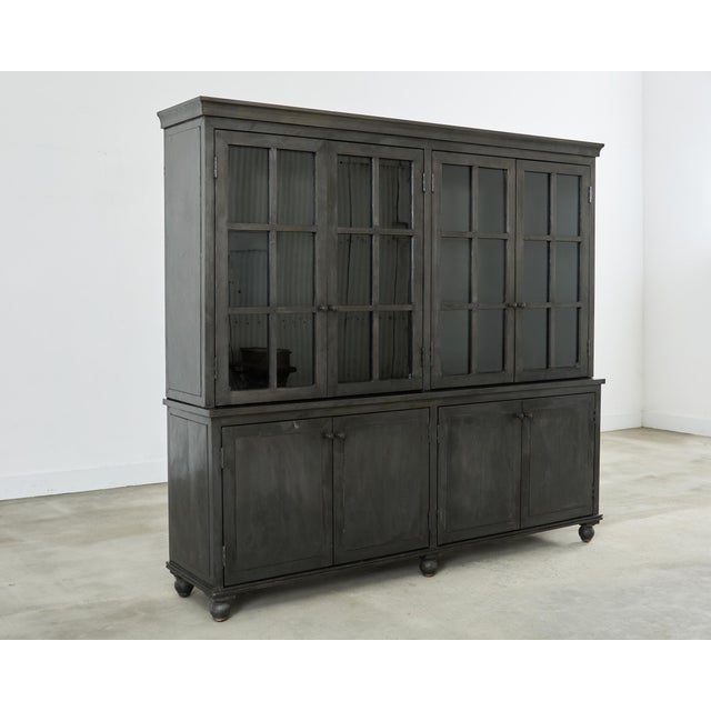 Artisan crafted large glass door bookcase cabinet constructed in two-parts. Attributed to Restoration Hardware's La Salle...