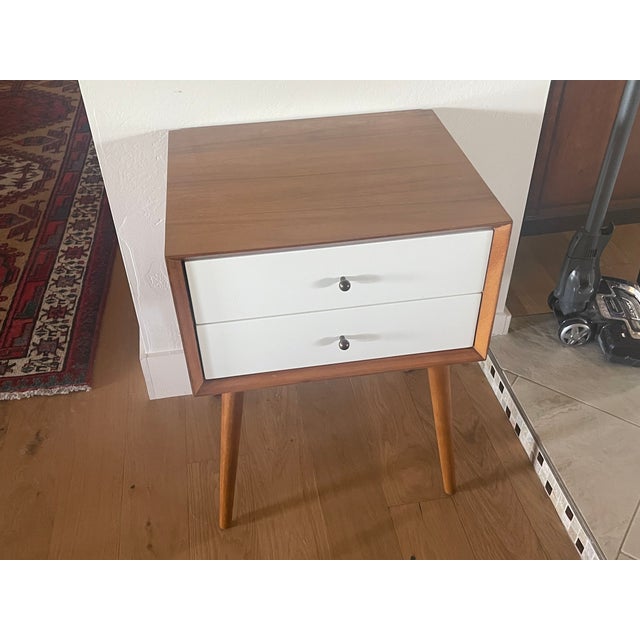 Pristine bicolor white and walnut wood nightstand with 2 drawers. I've owned this piece for the past 5 years and sold my...
