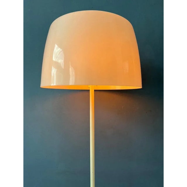 Very rare space age floor lamp by willem hagoort with acrylic glass shade in white colour. The lamp has a beautifully...