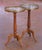 This elegant pair of antique French martini tables was crafted in France in the early 20th century, circa 1920, and...