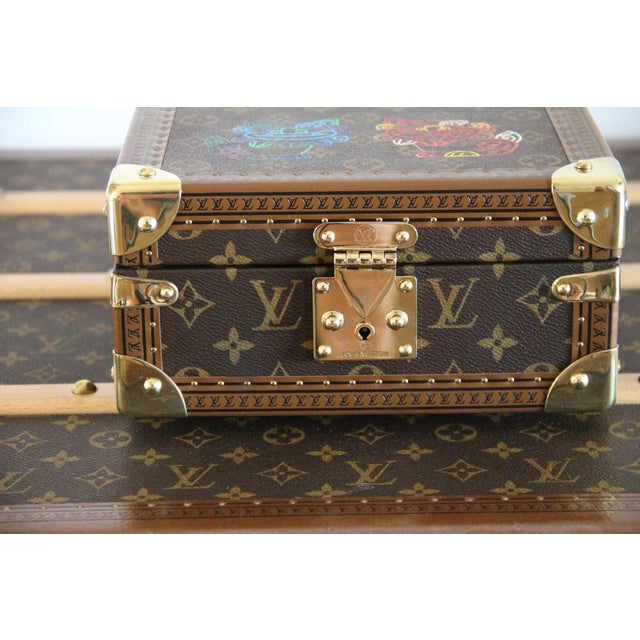 This Louis Vuitton jewelry box, crafted from Monogram canvas, has been customized with a design featuring two hand-painted...