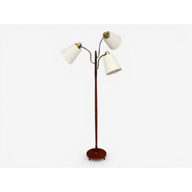 Swedish Mid-Century Modern, Adjustable Floor Lamp, Teak, Brass, Fabric, Sweden, 1970s A modernist floor lamp designed and...