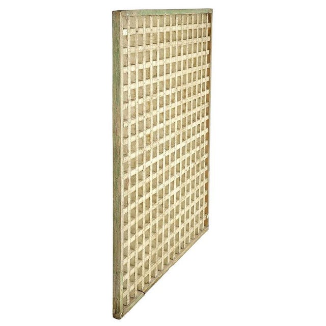 This weathered solid wood screen exudes an authentic charm that will appeal to lovers of retro decor and antique objects....