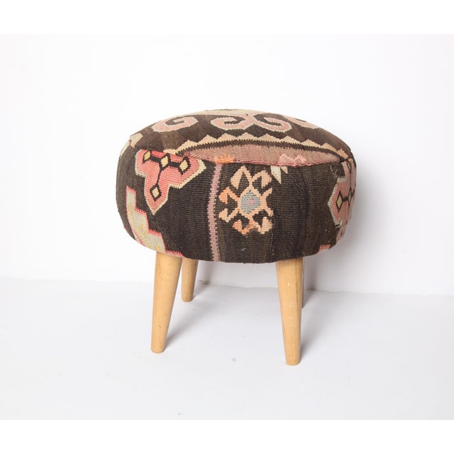 Art Deco Handwoven Vintage Kilim Upholstered Ottoman Stool | Tribal Wool Footstool With Wooden Legs For Sale - Image 3 of 8