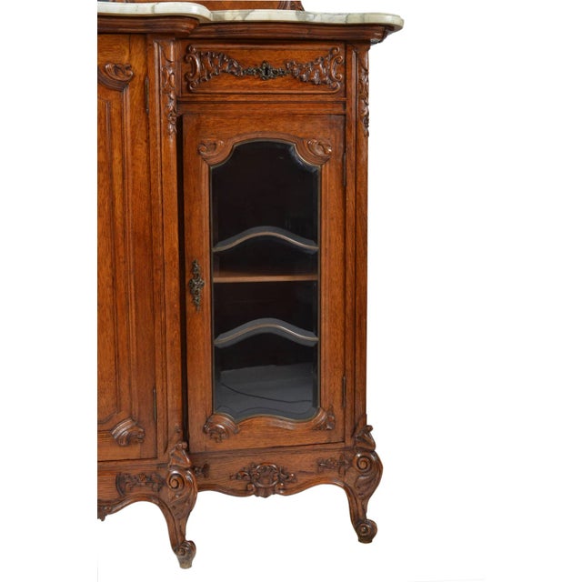 19th century French marble top Louis XV style step front Cabinet – Buffet -Sideboard, constructed out of oak with three...